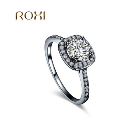 ROXI KÖVES GYŰRŰ 18 KARÁTOS ARANY BEVONATTAL